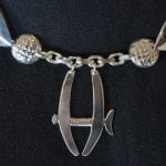 One part of the silver ceremonial chain of office for the Mayor. This one with the local boat symbol.