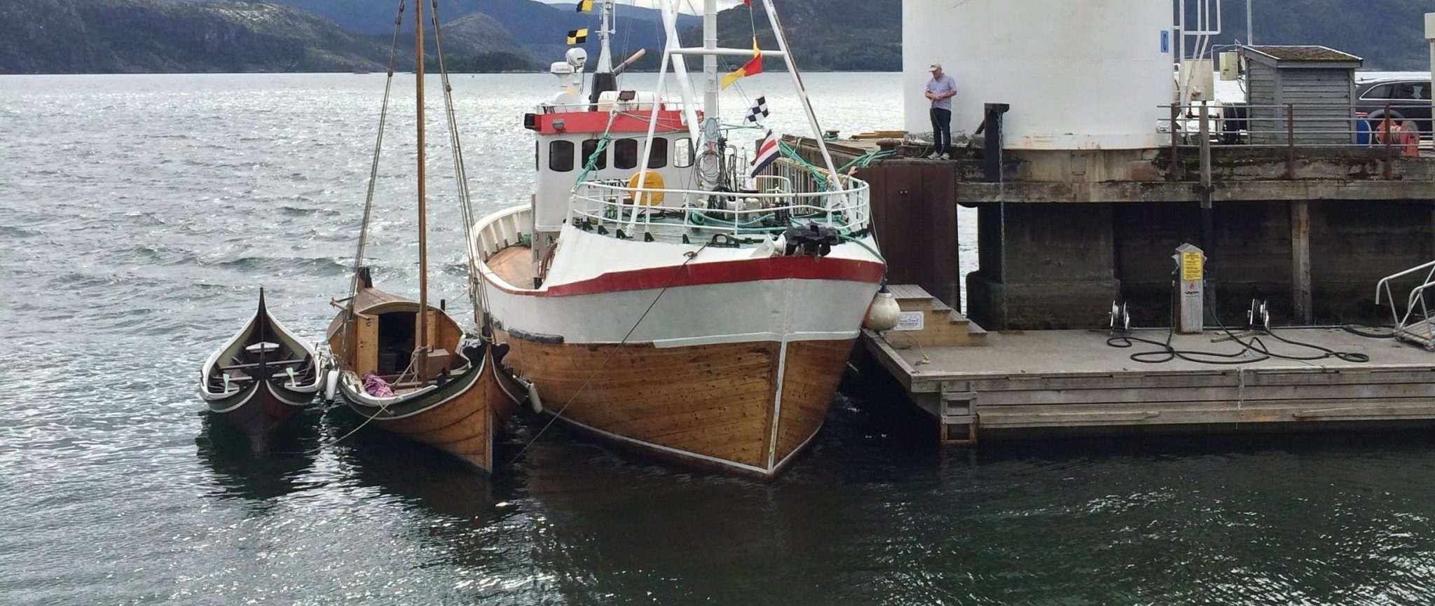 Local boats in different sizes made from light woodwork, standing next to the Tank at Hemnesberget.
