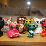Small colorful creatures made by artist, Yvonne.