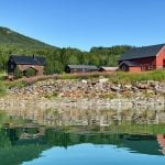 Stekvasselv Gård, a farm located next to the lake, Røssvatnet, in beautiful green nature surroundings.