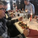 Happy people dining at Huset restaurant