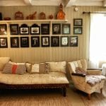 Wall inside of the main building at Inderdalen Farm, filled with portraits of the owners’ ancestors.