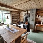 The kitchen in the main building at Inderdalen Farm with a dining table as well to enjoy the delicious home-made food.