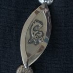One part of the silver ceremonial chain of office for the Mayor. This one with a sami symbol.