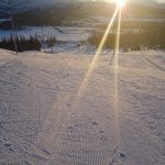 At the top of the down hill slopes in Bleikvasslia in great surrounding with the sun shining and a great mountain view.