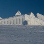 The cabin, Rabothytta completely covered in snow surrounded by a white snowy landscape as well.
