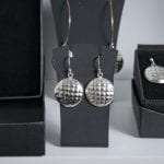 Beautiful silver jewelry in the shape of the local bread, “kamkake”, made by goldsmith Merete Mattson.