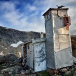 A small little cabin made of rocks and metal located on the path up to Rabothytta to function as a shelter during the winter.