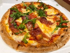 Delicious-looking bacon-pizza from the gas station, Best at Hemnesberget.