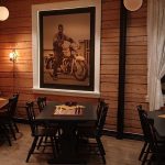 Cozy ambiance in an old wooden house with chess on the tables.